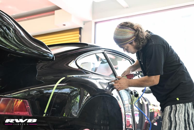 Nakai hand-sanding the 964
