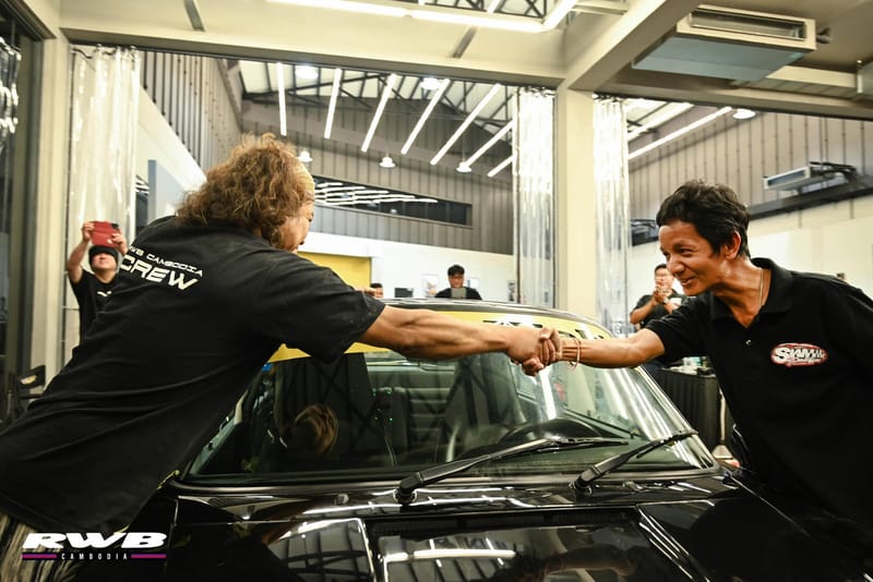 Nakai and Tea Siam fist bump