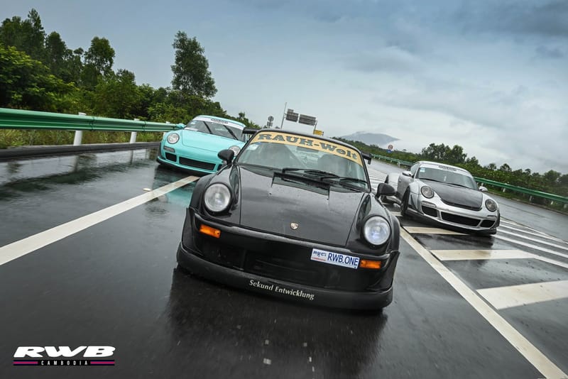 Three cars formation in rain